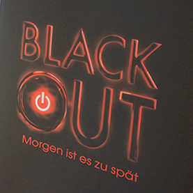 Plakat von dem Roman „Blackout“ auf der Messe PIT, Berlin September 2012